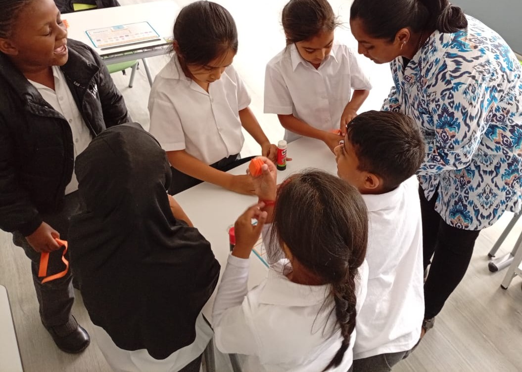 Learners gathered around an activity