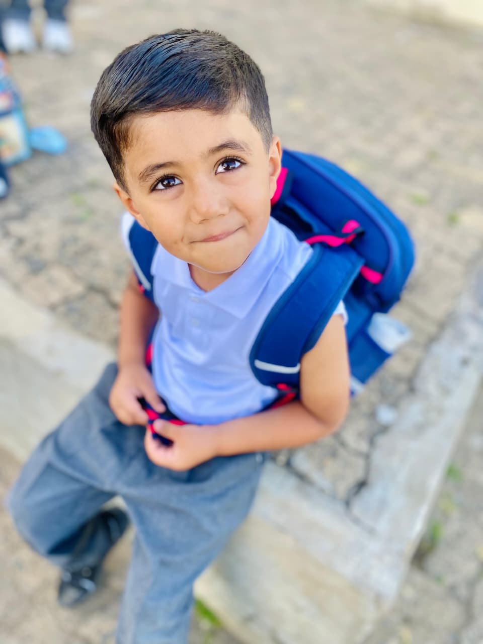 Young learner smiling outside