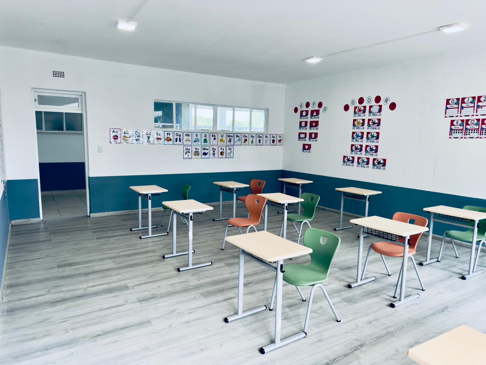 Olive River Schools classroom with desks
